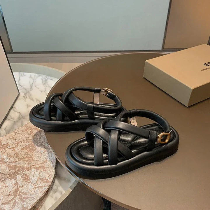 Premium thick-soled sandals in black, beige, and blue colours with a sheepskin upper and rubber sole