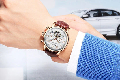 Automatic mechanical watch with genuine leather strap, featuring a stylish hollow-out dial design