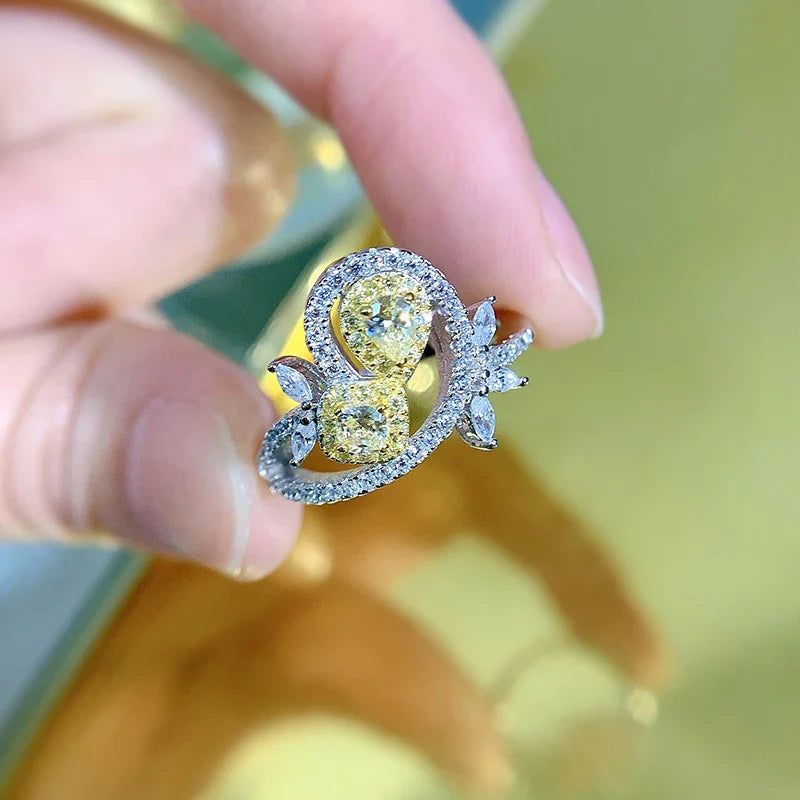 Elegant 925 sterling silver fashion ring with a yellow diamond centre stone