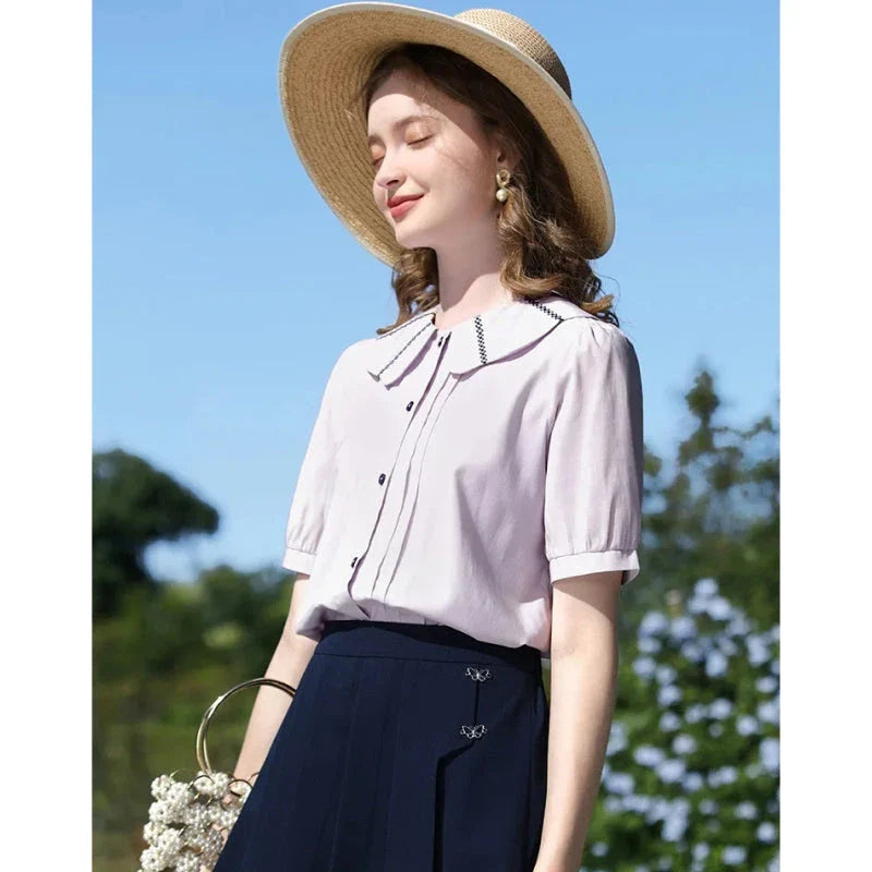 Elegant French puff sleeve blouse with timeless Peter Pan collar, available in purple and various sizes