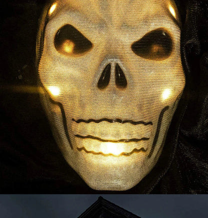 Voice-activated Halloween decoration with ghost-shaped design, lighting, and sound effects
