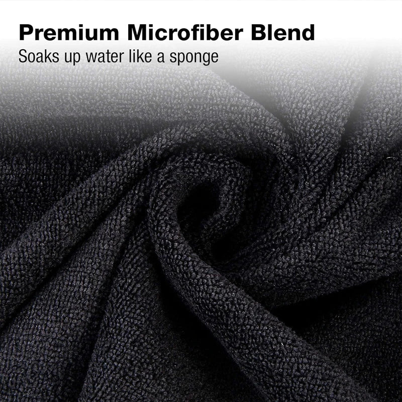 Premium microfibre salon towels in black, featuring a large size, lightweight and highly absorbent design for efficient hair drying