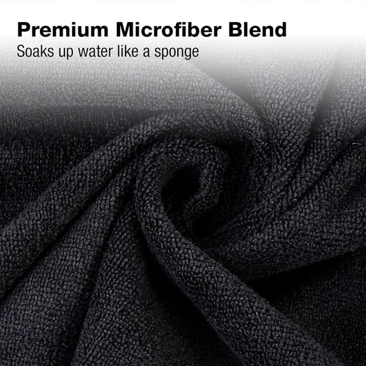 Premium microfibre salon towels in black, featuring a large size, lightweight and highly absorbent design for efficient hair drying