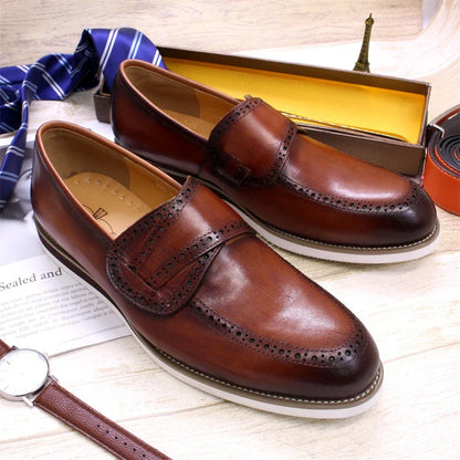 Premium handcrafted British leather casual loafers for men, featuring a round toe, flat heel, and durable rubber sole