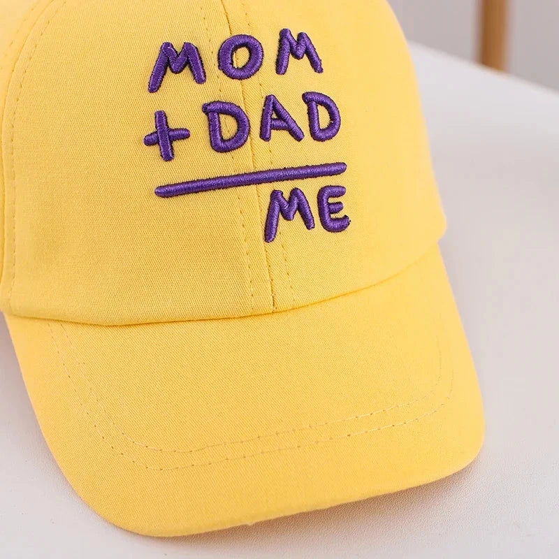 Adjustable cotton sun hat for kids with 'MOM+DAD=ME' embroidery, offering UV protection and breathable comfort