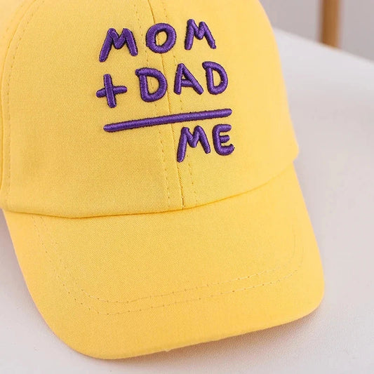 Adjustable cotton sun hat for kids with 'MOM+DAD=ME' embroidery, offering UV protection and breathable comfort