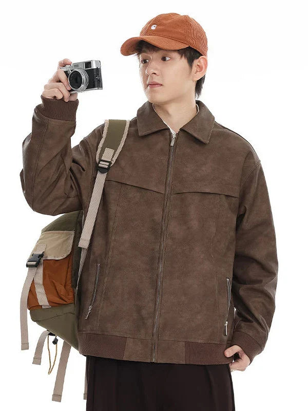 A classic distressed leather jacket in a relaxed, unstructured fit suitable for both men and women