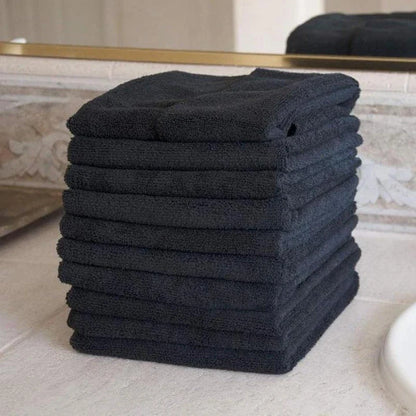 Premium microfibre salon towels in black, featuring a large size, lightweight and highly absorbent design for efficient hair drying