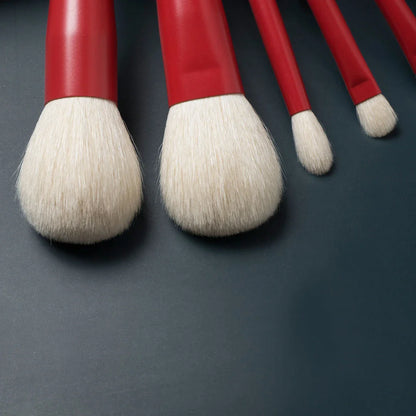 Elegant 7-Piece Red Makeup Brush Set with Soft Goat Hair Bristles for Flawless Powder, Eye Shadow, and Blush Application