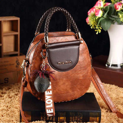 Fashionable women's one-shoulder diagonal bag in caramel, nude pink, black, wine red, and retro brown colours