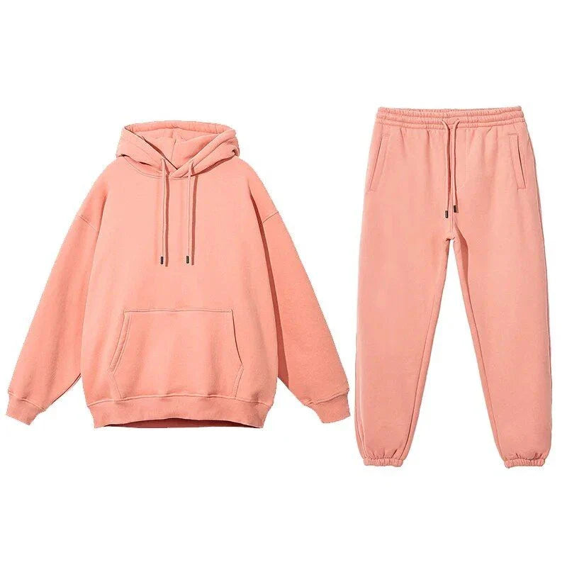 Cosy fleece hoodie and jogger set in light pink, grey, and navy blue colours for ultimate comfort and style
