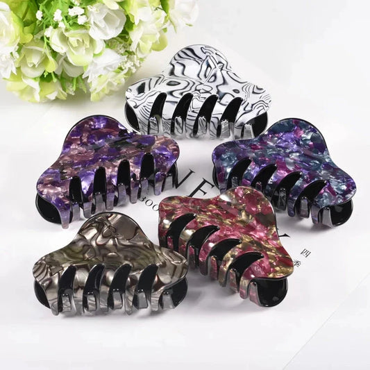 Elegant large floral acrylic hair clips in various colours for a sophisticated look