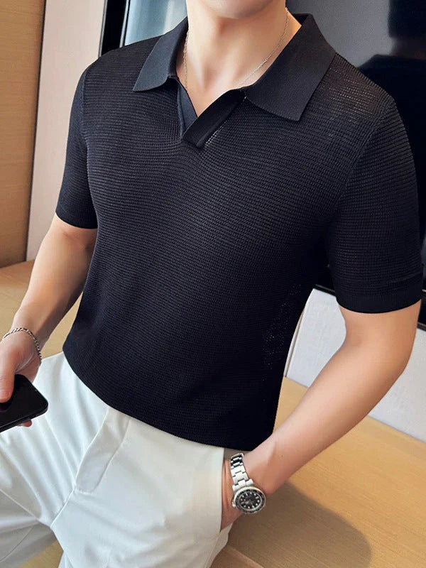 A premium cotton blend polo shirt in classic colours, featuring a v-neck lapel collar and slim fit design for a sophisticated casual look.