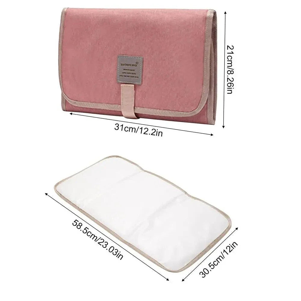 Premium waterproof changing pad for babies, featuring a compact, foldable design and soft, skin-friendly materials for a comfortable, hygienic nappy changing experience on the go.