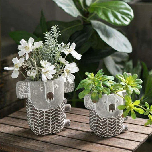 Charming retro koala-shaped cement planter for succulents and small flowers, available in two sizes