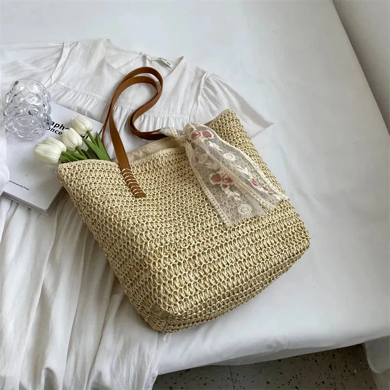 Elegant handcrafted woven straw tote bag in beige colour, perfect for summer outings and carrying essentials