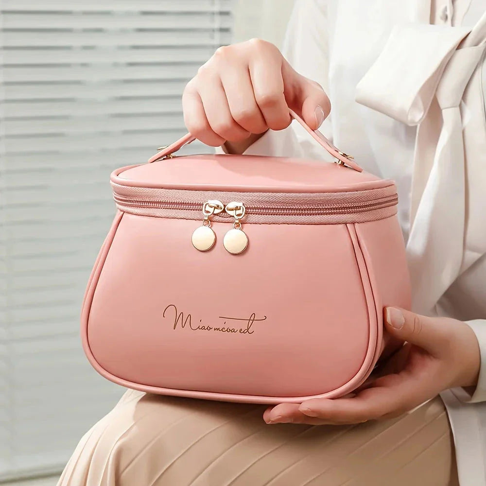 Luxurious waterproof makeup organiser with spacious design, waterproof materials, and convenient carry handle for travel use