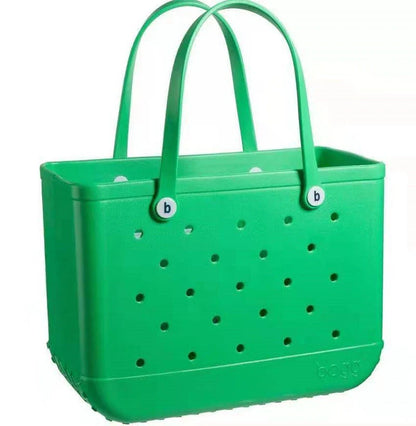 Premium waterproof beach tote bag in various vibrant colours, featuring spacious main compartment and multiple pockets for organised storage