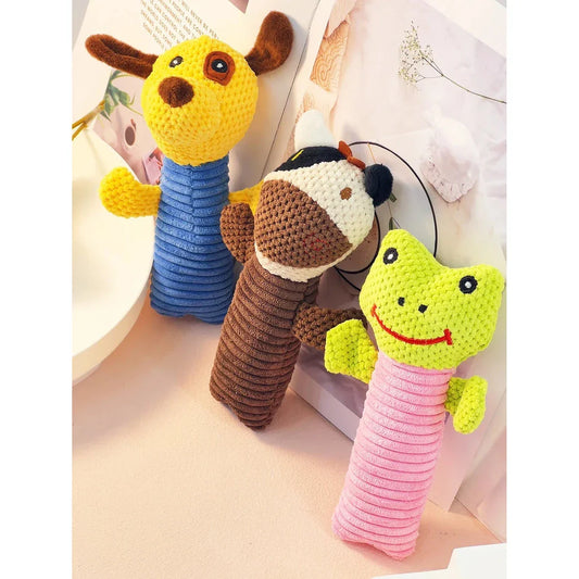 Interactive plush dog toys in the shape of corn kernels and dog figures, made of soft fleece material with built-in squeakers for endless playtime fun.