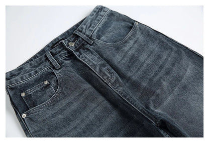 A pair of stylish retro-inspired Japanese jeans in black and grey, featuring a mid-rise waist and straight leg silhouette for a flattering, comfortable fit.
