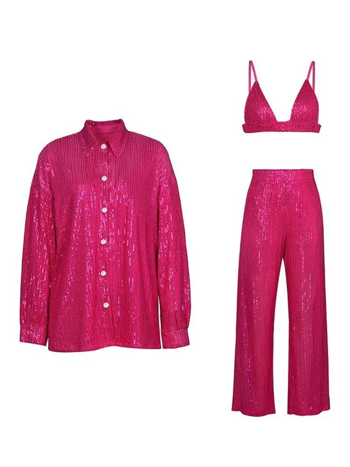 Elegant woman wearing a luxurious sequin top and pants set, perfect for a glamorous evening event