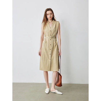 Elegant sleeveless midi shirt dress with V-neck and side pockets, perfect for summer in the UK