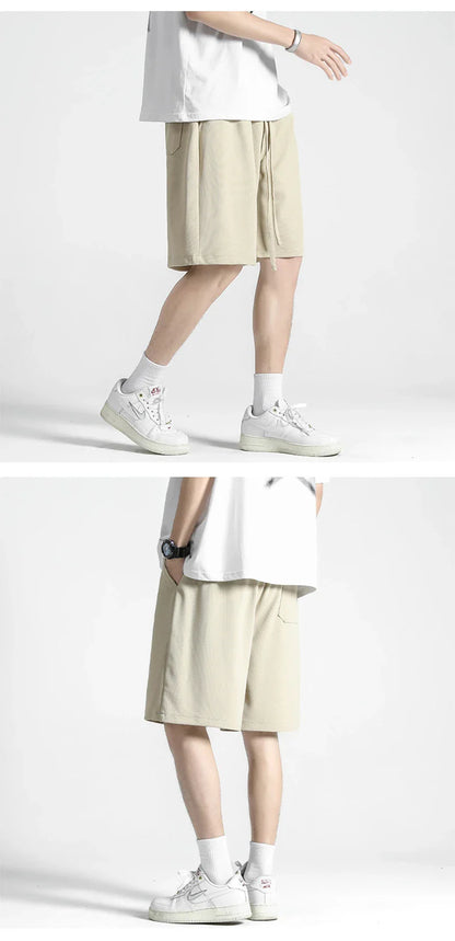 Premium straight-fit drawstring trousers in white, khaki, and black colours for stylish British men