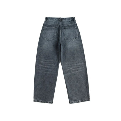 A pair of stylish retro-inspired Japanese jeans in black and grey, featuring a mid-rise waist and straight leg silhouette for a flattering, comfortable fit.