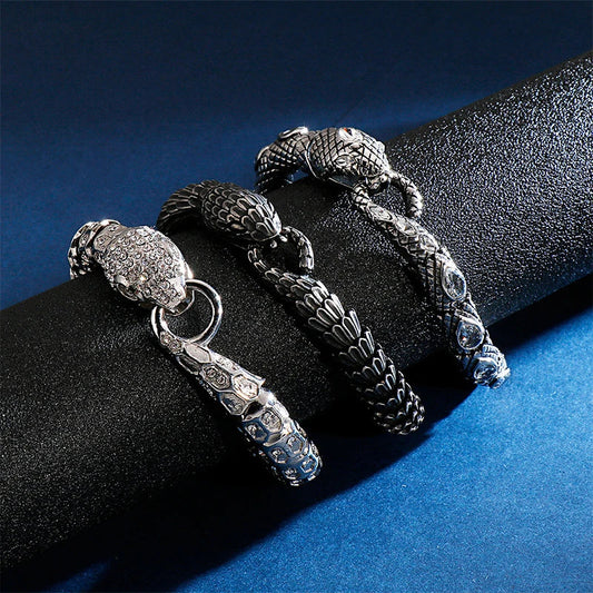 Elegant stainless steel snake bracelet in a sleek, polished black finish for men