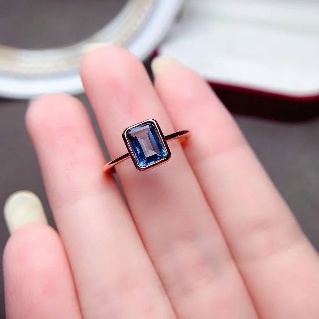 Elegant women's sterling silver ring with rose gold finish, showcasing exceptional British craftsmanship