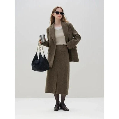 Sophisticated wool blazer and skirt set for professional women, featuring a chic double-breasted jacket and an elegant long skirt with a stylish front split
