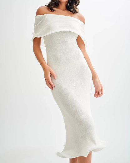 Chic white sleeveless dress with slim-fit silhouette, perfect for stylish occasions in the UK