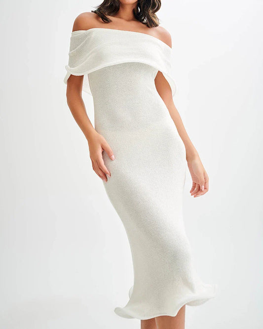 Chic white sleeveless dress with slim-fit silhouette, perfect for stylish occasions in the UK