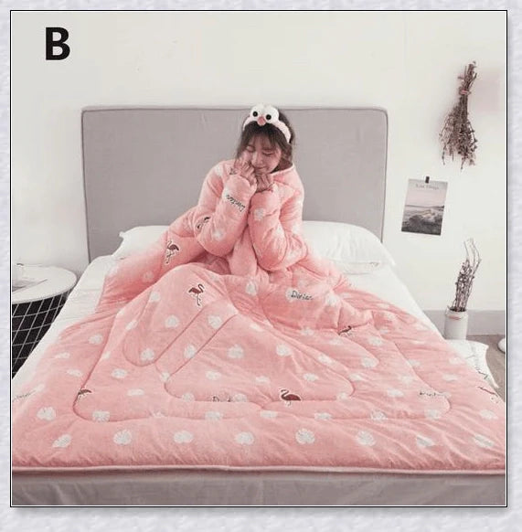 A cosy, wearable quilt with sleeves in a variety of colourful designs, perfect for staying warm and comfortable during the winter months.