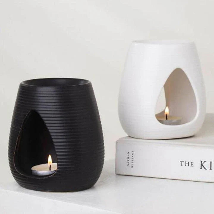 Trendha Porcelain Aroma Diffuser and Candle Holder in white and black finishes, featuring a minimalist design for stylish home decor and relaxing aromatherapy