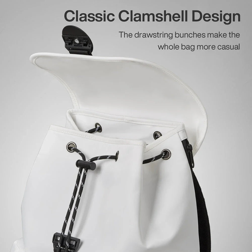 A stylish and versatile 16-inch laptop backpack with a padded compartment, water-repellent fabric, and breathable mesh design