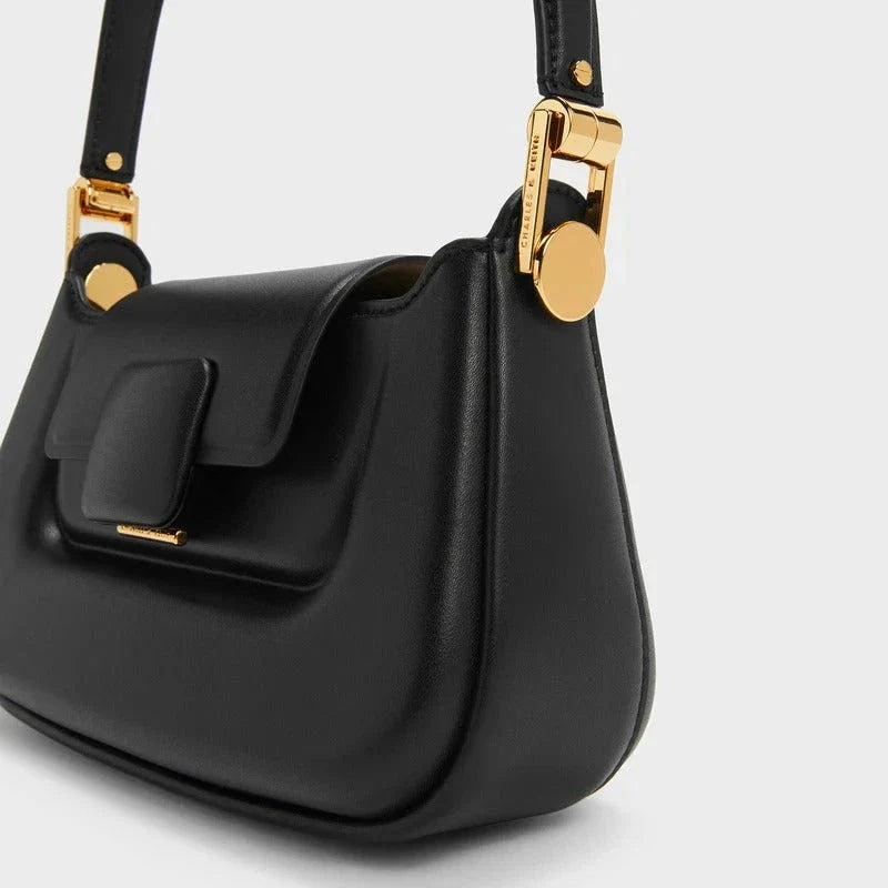 Sophisticated silk-lined TPU crossbody baguette bag in green, black, and navy colours