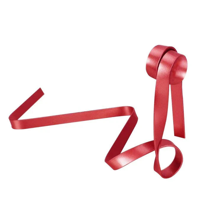 Floating wine bottle holder with sophisticated ribbon-like design, creating a mesmerising illusion of weightlessness