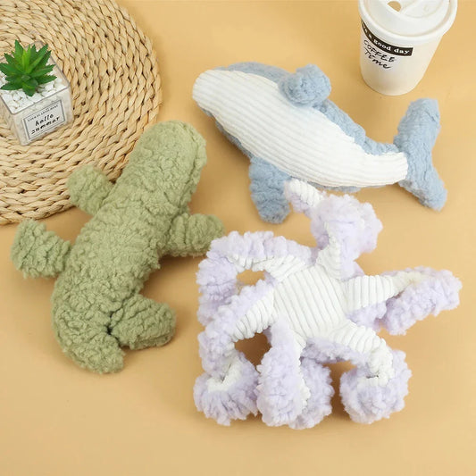Plush crocodile-shaped squeaky dog toy made of durable, bite-resistant fleece material