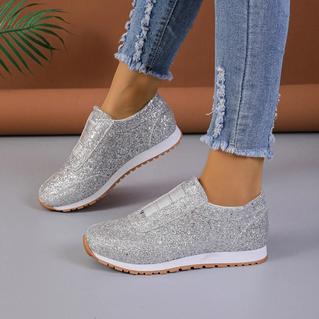 Premium sequinned flats with round toe and slip-on design, perfect for casual wear and special occasions.