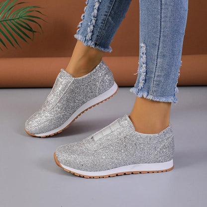 Premium sequinned flats with round toe and slip-on design, perfect for casual wear and special occasions.