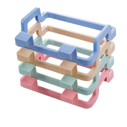 Cupboard-mounted trash bag holder in various colours for organising kitchen waste storage