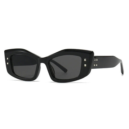 Retro cat eye sunglasses with rivet details, offering a stylish and protective eyewear solution.