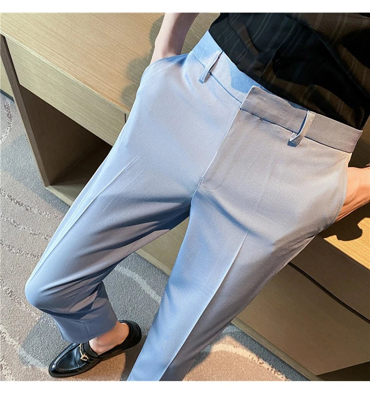 Premium men's suit trousers in a variety of colours, featuring a subtle textured drape and exceptional stretch for all-day comfort and style.