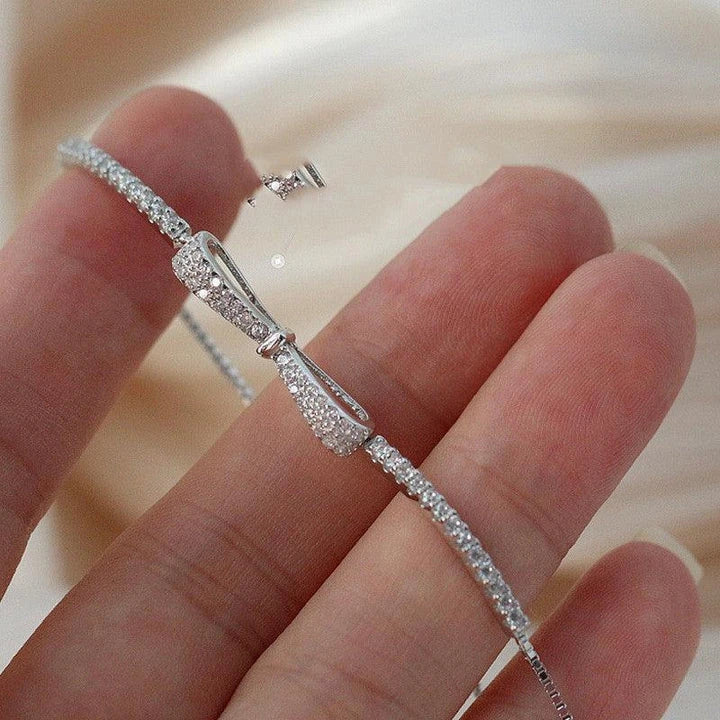 Elegant 925 sterling silver bow bracelet with minimalist design for stylish women