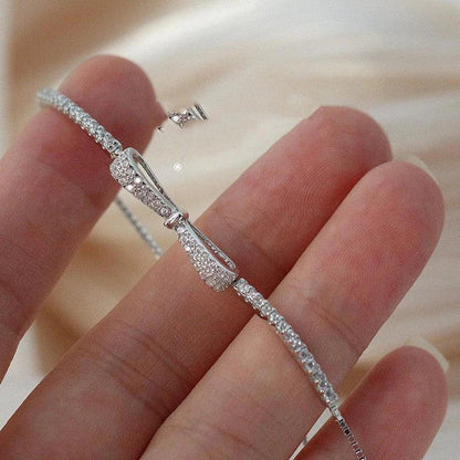 Elegant 925 sterling silver bow bracelet with minimalist design for stylish women