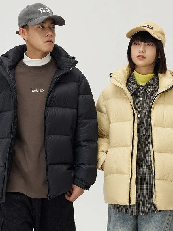 A stylish and warm down jacket with a hooded design, perfect for winter weather.