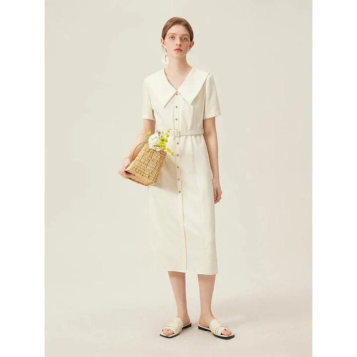 Elegant mid-calf summer dress in a sophisticated style, suitable for professional office wear and special occasions.