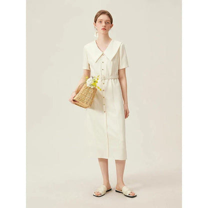 Elegant mid-calf summer dress in a sophisticated style, suitable for professional office wear and special occasions.