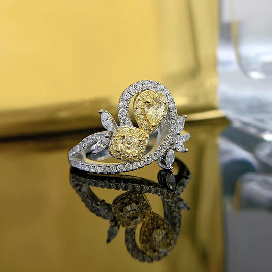 Elegant 925 sterling silver fashion ring with a yellow diamond centre stone